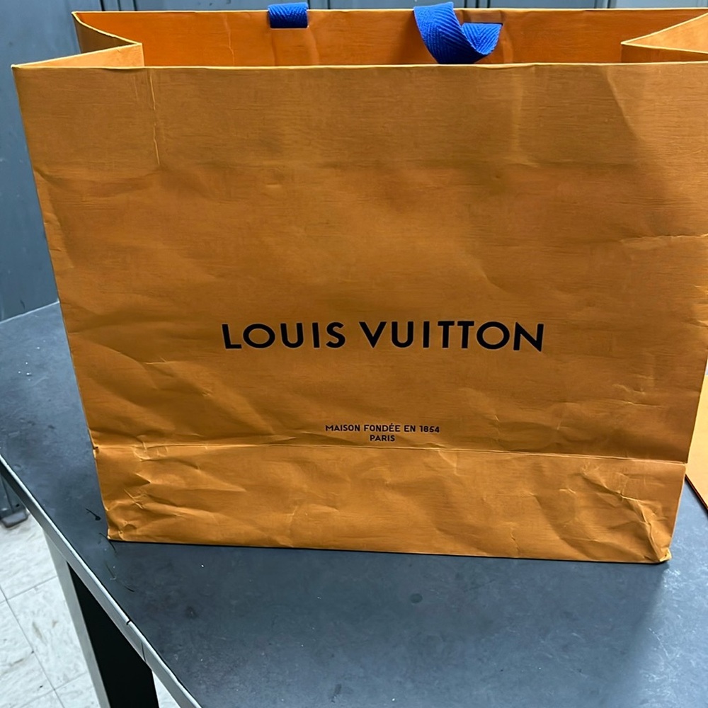 Large Louis Vuitton shopping bag with blue fabric handles